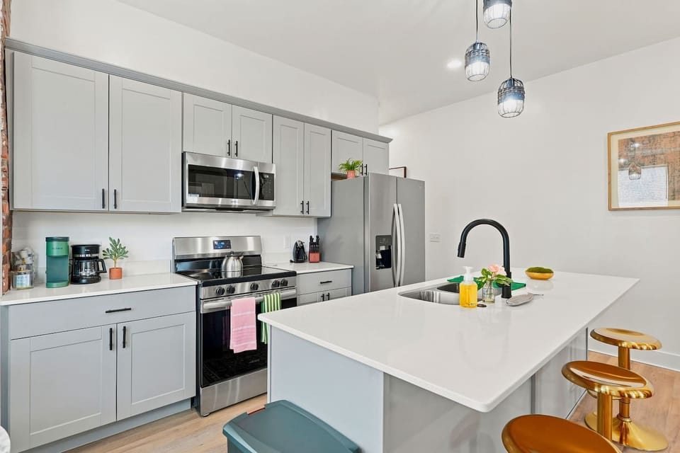 Fully equipped kitchen with stainless steel appliances, gas range, dishwasher, and microwave. Great for cooking during extended stays in Fort Wayne.