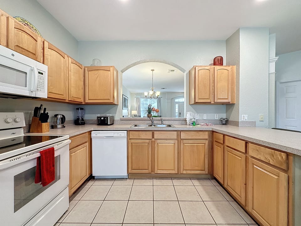 Large, fully-equipped kitchen with tons of counter space and all the necessary amenities for preparing family meals.