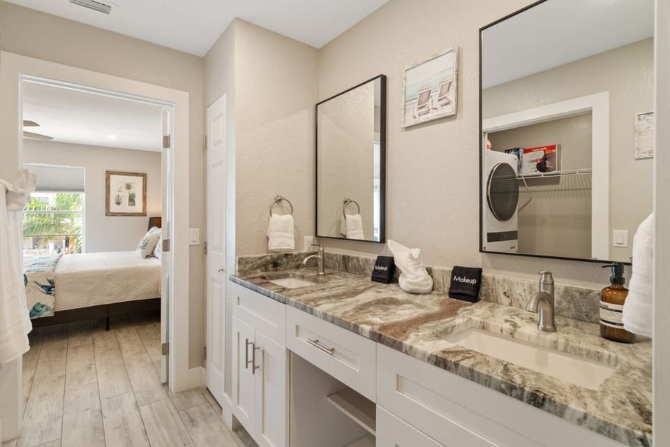 Double vanity in the primary bath — two people, one morning, zero waiting.
