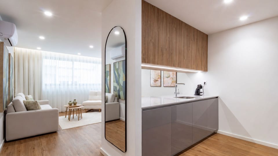 Retreat to this tranquil bedroom, offering a plush bed for restful sleep and ample storage in the built-in wardrobes, with a luxurious en-suite vanity area just beyond. The soft lighting creates a serene ambiance, perfect for unwinding. #CozyBedroom #Ensu