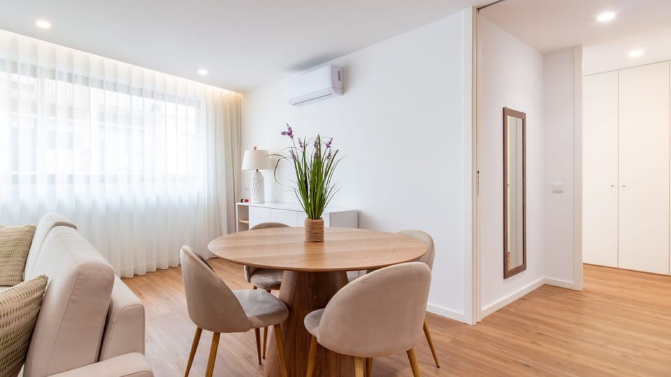 Bright and inviting, this open-plan living and dining area is designed for comfort and connection, making it ideal for relaxing with loved ones or enjoying a delicious meal together. The ample natural light creates a refreshing ambiance throughout the day