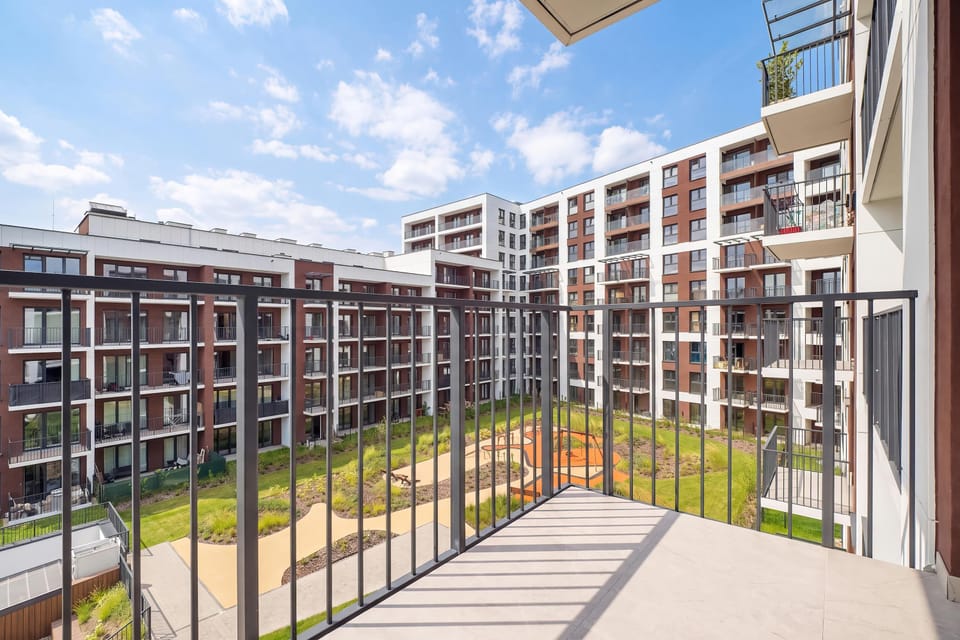 The balcony provides a perfect spot for enjoying the fresh air.
