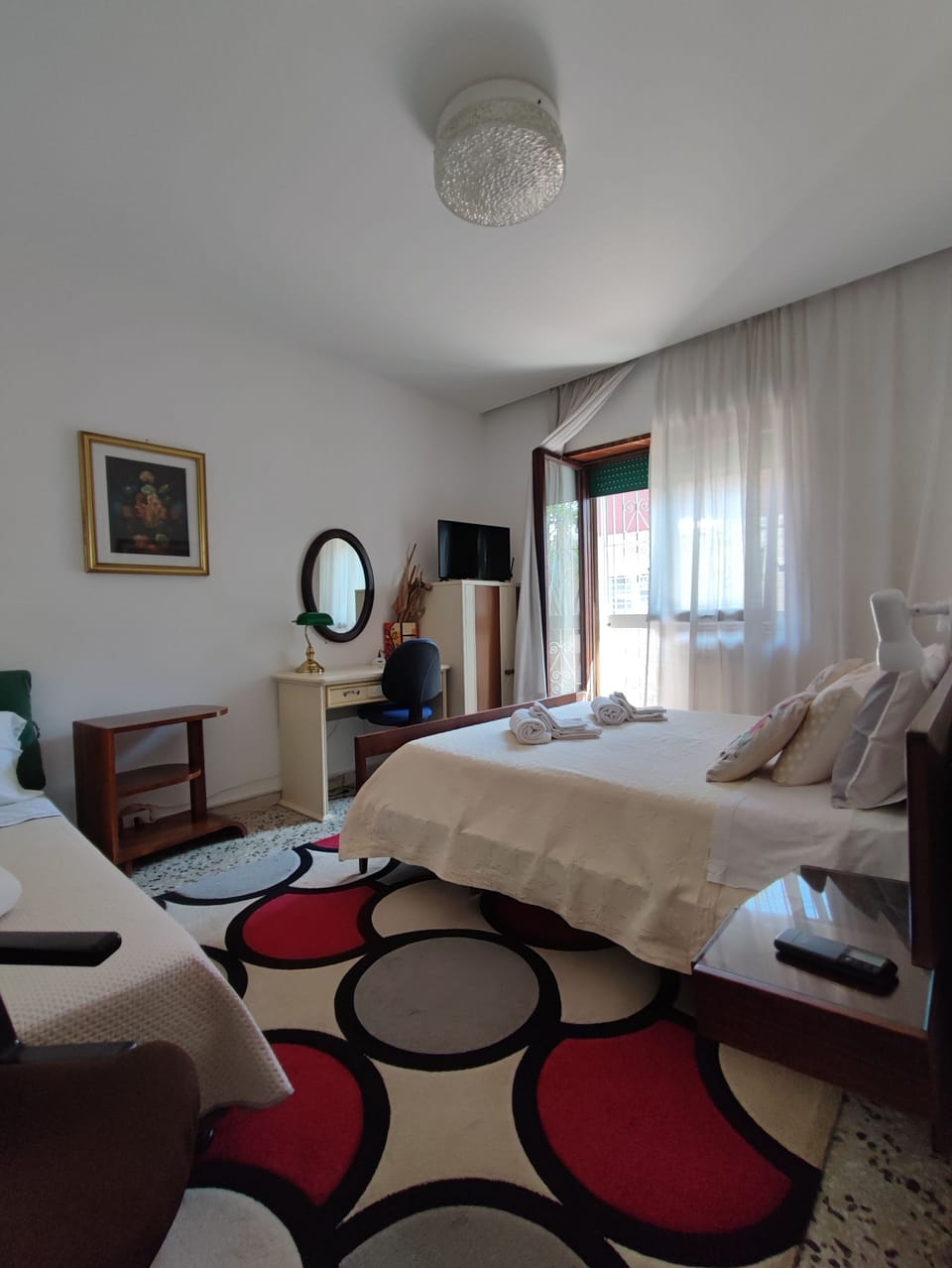 Camera Tripla con terrazzo, vista giardino | Iron/ironing board (on request), WiFi (free)