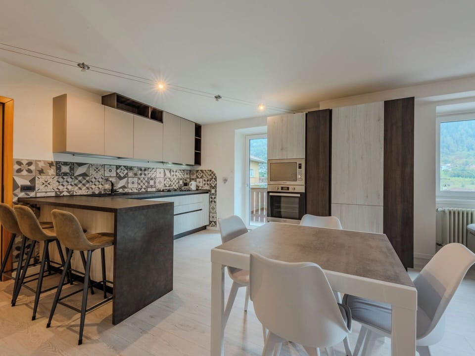 Furniture, Interior Design, Flooring, Floor, Wood, Countertop, Ceiling, Kitchen, Wood Flooring, Light Fixture