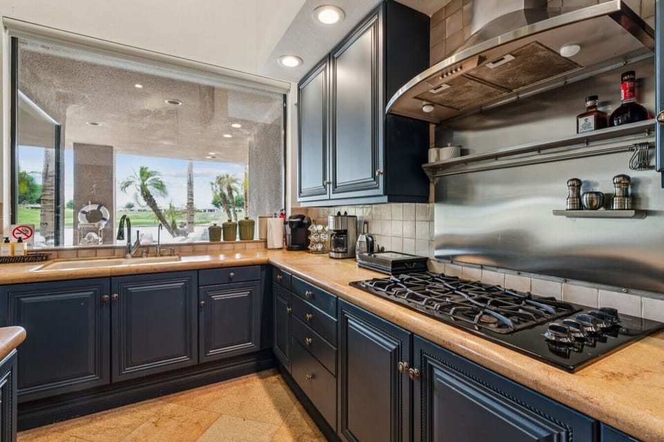 Stylish kitchen with gas range and ample counter space