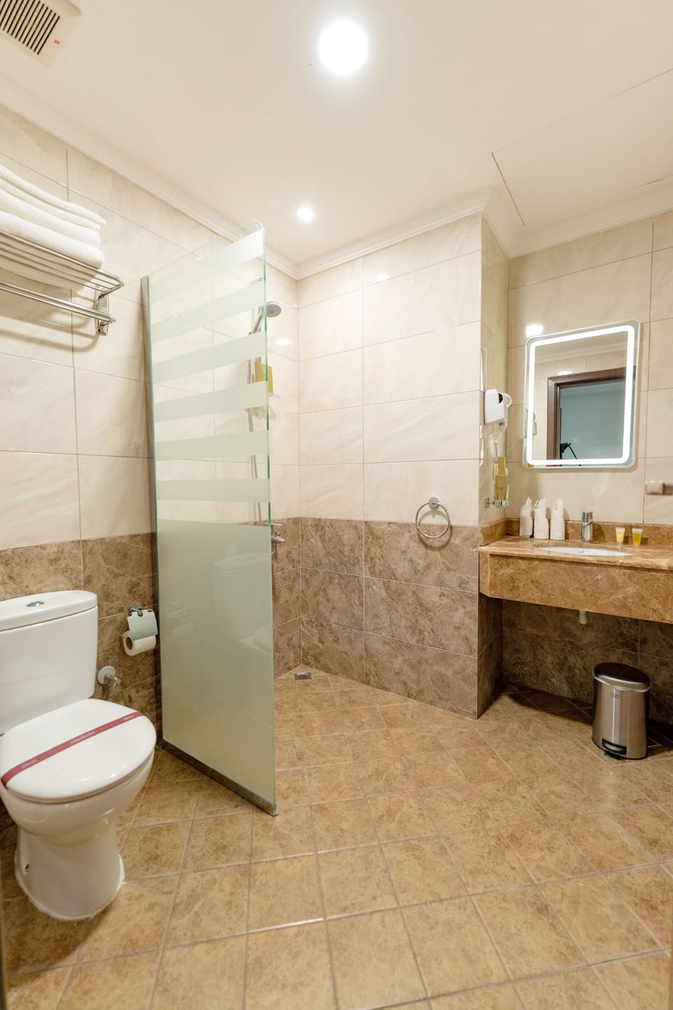 Shower, free toiletries, hair dryer, towels