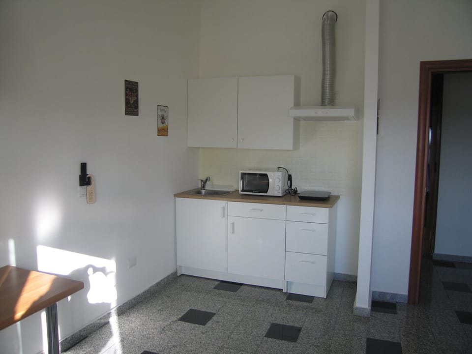 Deluxe Room, Balcony, City View | Interior