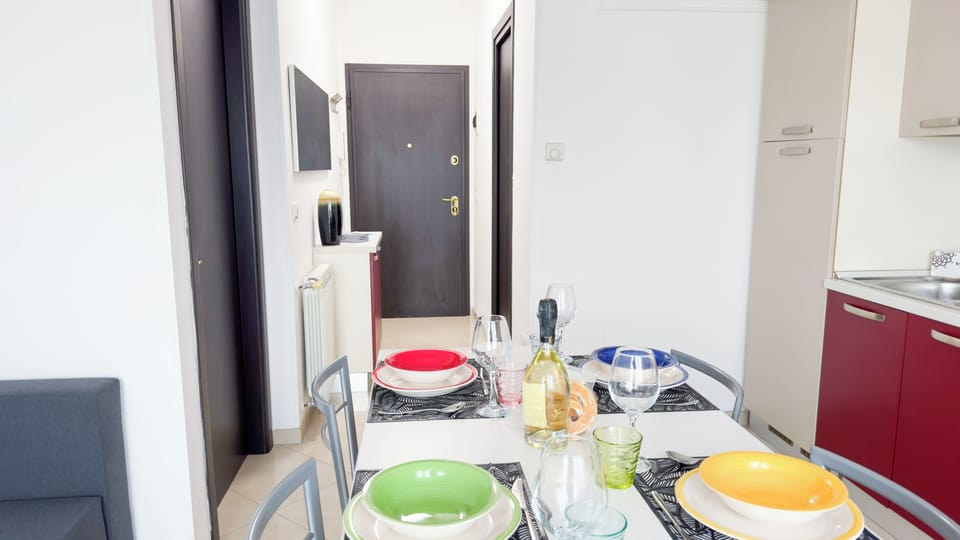 Apartment (1 Bedroom) | Living area | 32-inch TV with cable channels