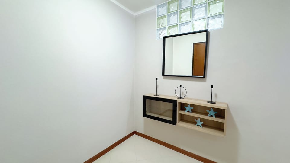 Apartment (2 Bedrooms) | Living area | 32-inch TV with cable channels