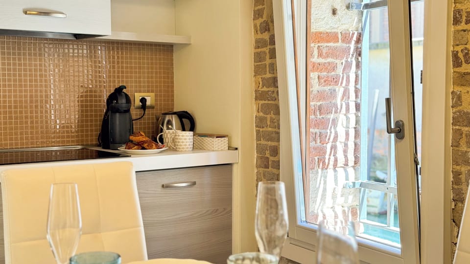 Apartment (1 Bedroom) | Private kitchenette | Espresso maker, microwave, electric kettle, highchair