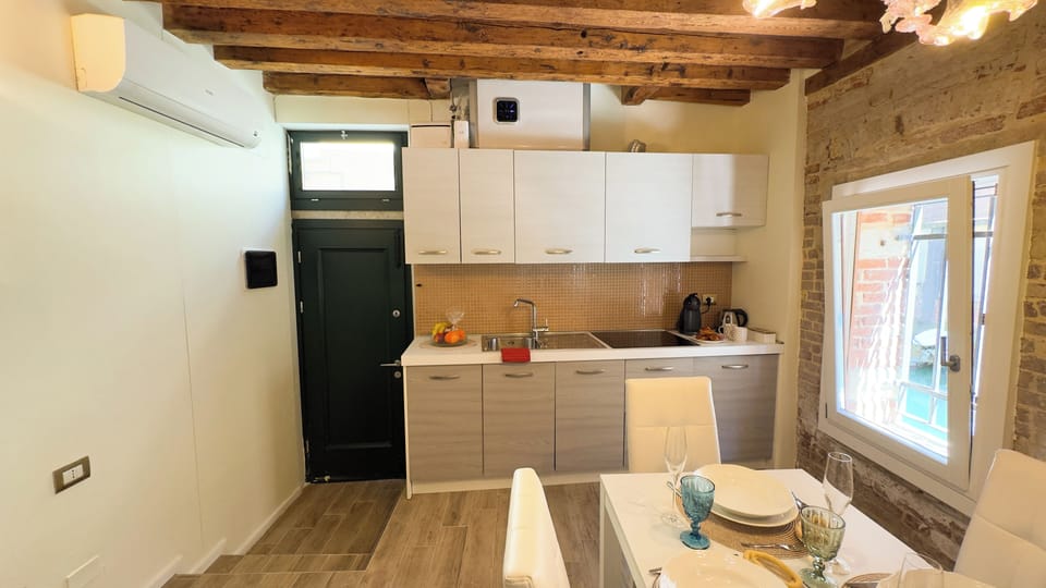Apartment (1 Bedroom) | Private kitchenette | Espresso maker, microwave, electric kettle, highchair