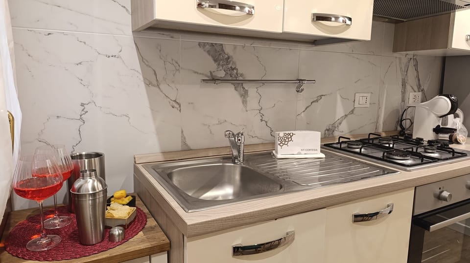 Apartment (1 Bedroom) | Private kitchenette | Espresso maker, oven, electric kettle, highchair