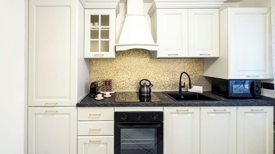 Apartment (2 Bedrooms) | Private kitchen | Espresso maker, microwave, electric kettle, highchair