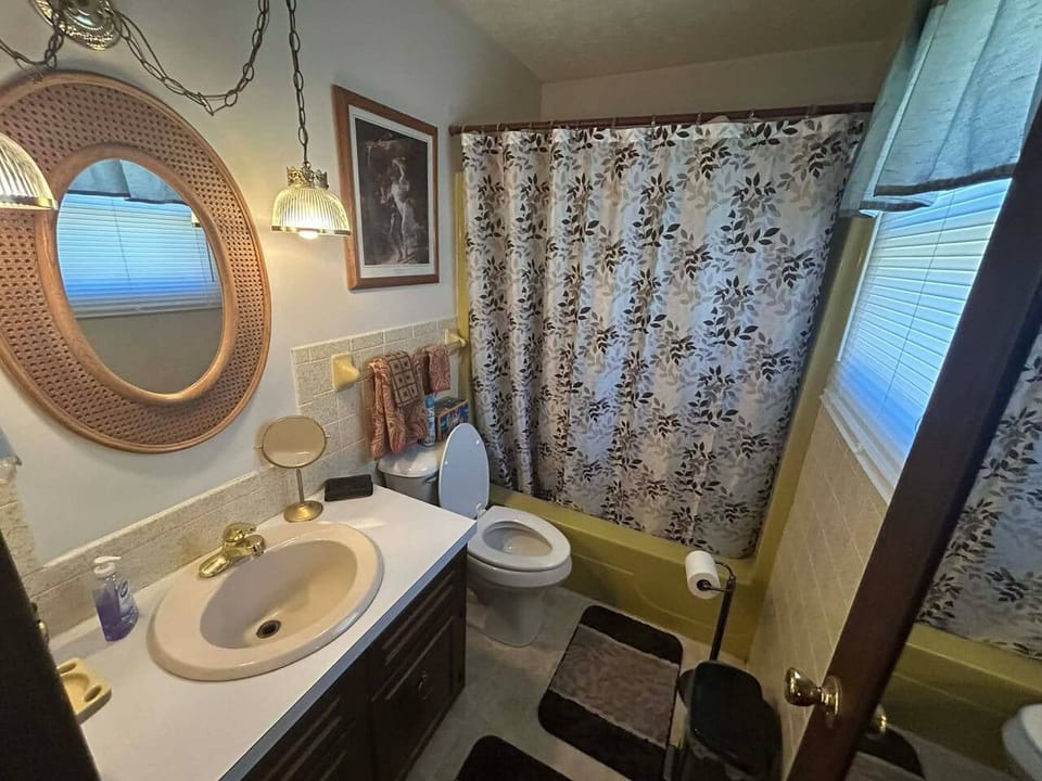 master bathroom with tub and shower