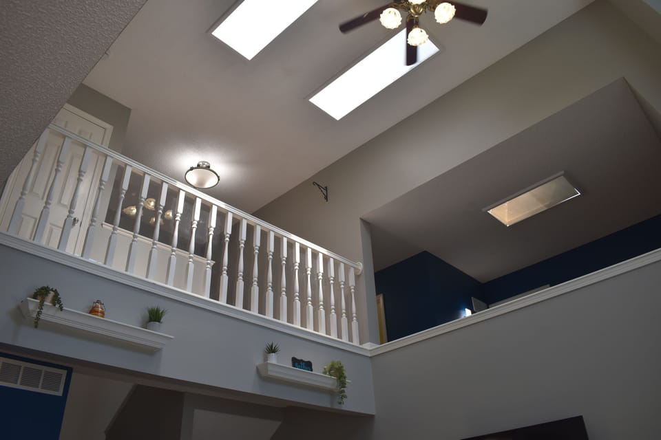 Convenient main-level half bath with laundry located near the kitchen