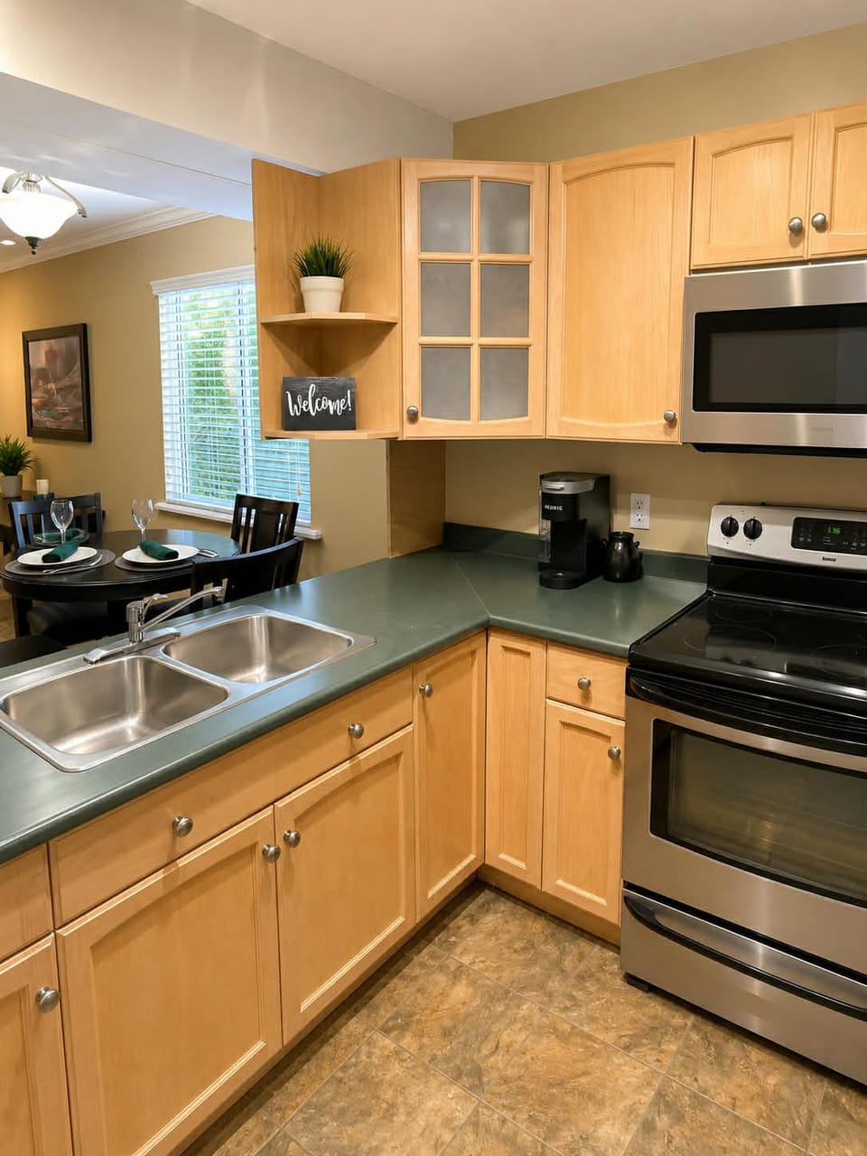 Full size kitchen with Keurig Coffee maker & all dishes & cutlery for cooking .