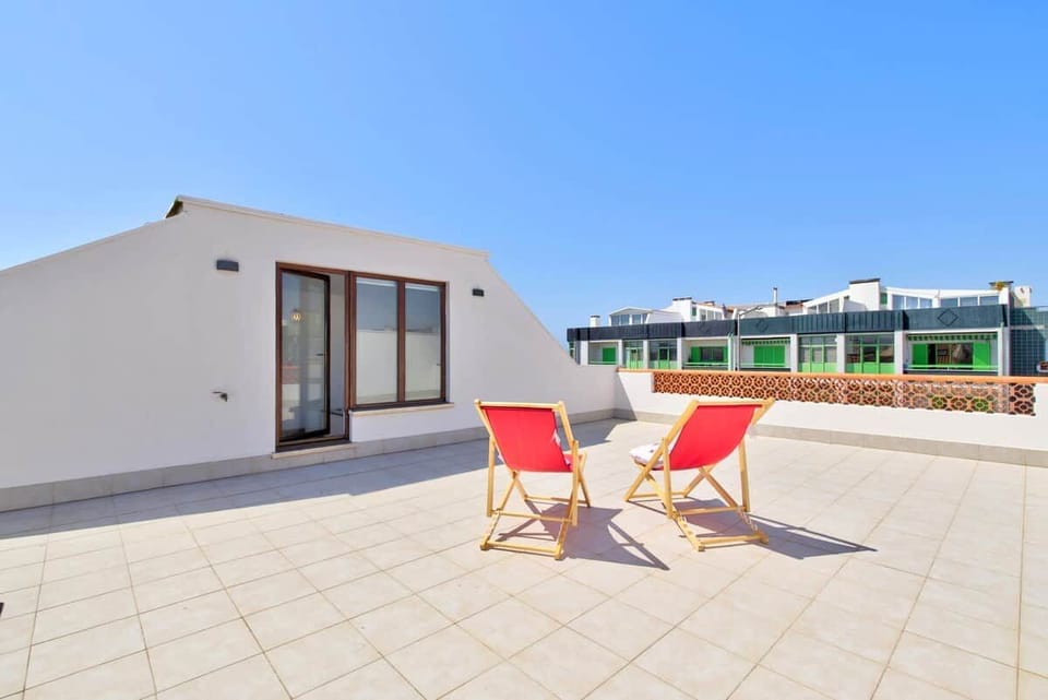 Private swimming pool and patio area, perfect for cooling off under the Portuguese sun.