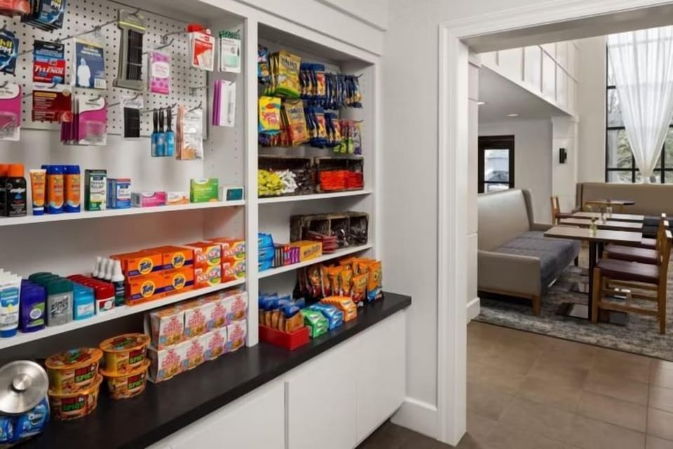 On-site pantry stocked with snacks, drinks, and grab-and-go essentials around the clock