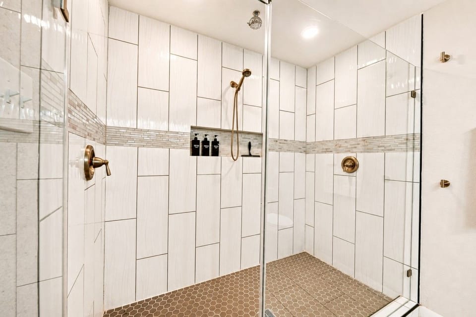Walk-in shower with modern fixtures