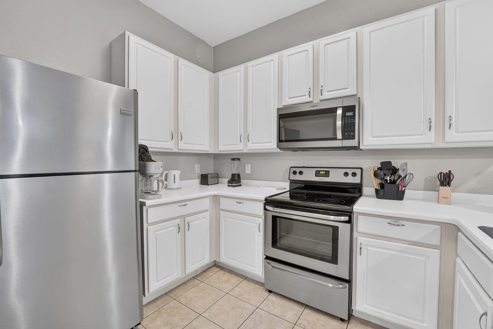 Prepare meals with ease in the condo's fully equipped kitchen.