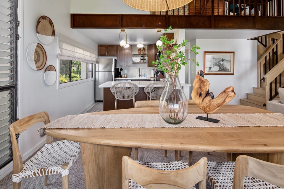 Breakfast at the big table, with the kitchen a few steps behind for refills.