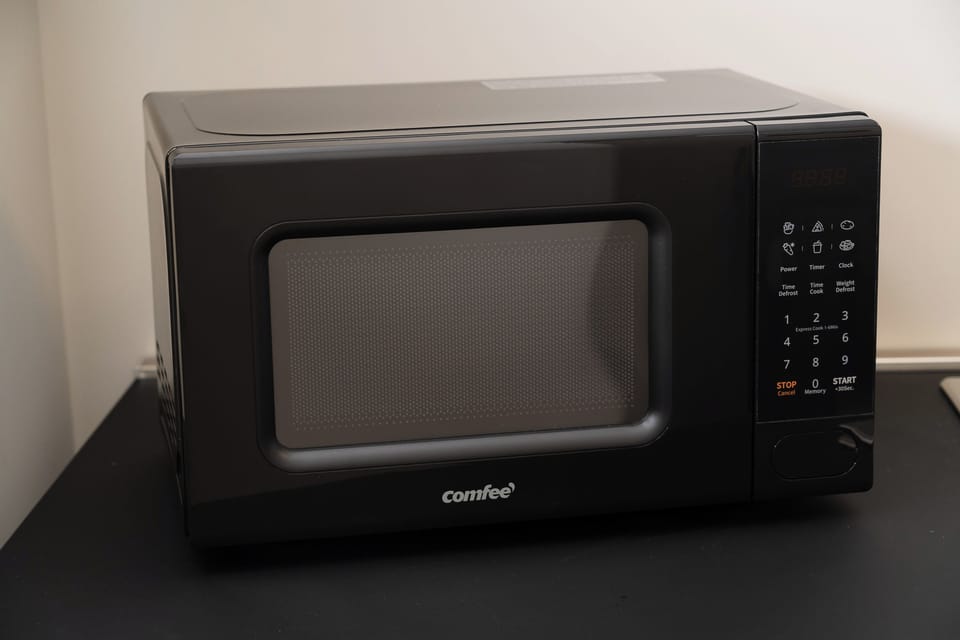 Apartment (1 Bedroom) | Private kitchen | Stovetop, electric kettle, cookware/dishes/utensils, dining table