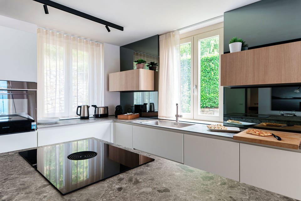 Villa, Lake View | Private kitchen | Coffee/tea maker, full-size fridge, microwave, oven