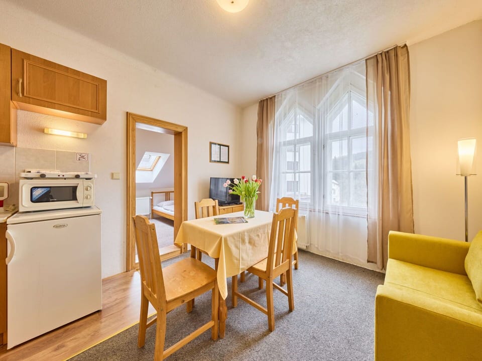 Furniture, Table, Window, Plant, Cabinetry, Wood, Kitchen Appliance, Gas Stove, Lighting, Building