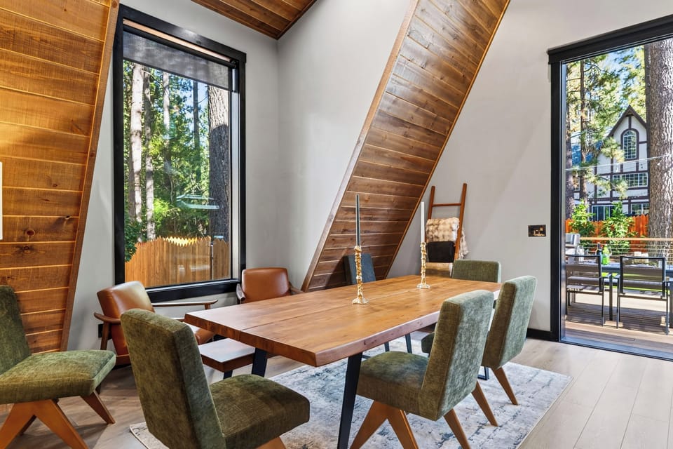 Forest views and warm wood architecture create an inviting backdrop for memorable group meals.