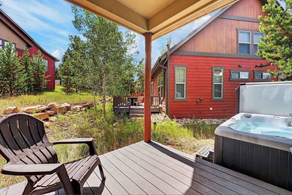 Soak in our private hot tub or relax on the back deck.