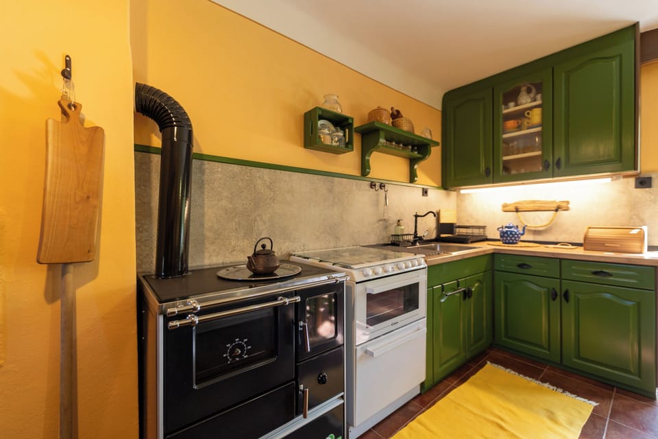 Comfort House, Hill View | Private kitchen | Coffee/tea maker, highchair, mixer, cleaning supplies