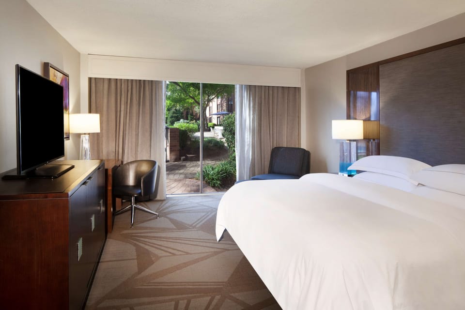 Premium bedding, down comforters, pillowtop beds, in-room safe