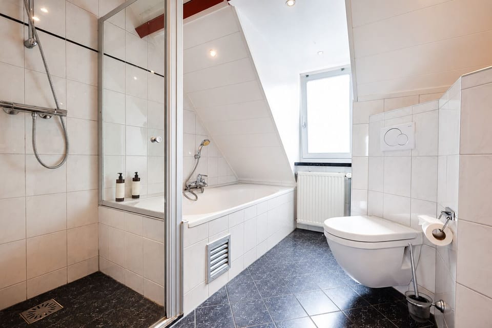 Junior Room | Bathroom | Designer toiletries, hair dryer, towels, soap
