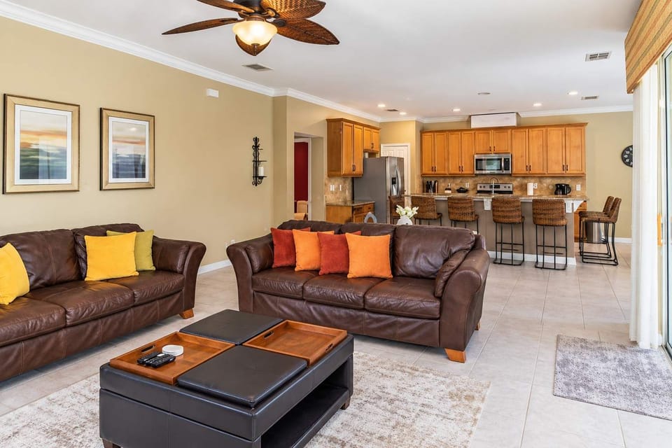 Comfortable family room that flows seamlessly into the fully-equipped kitchen and breakfast bar