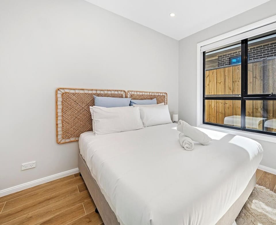 Clean and comfortable bedroom with fresh linens