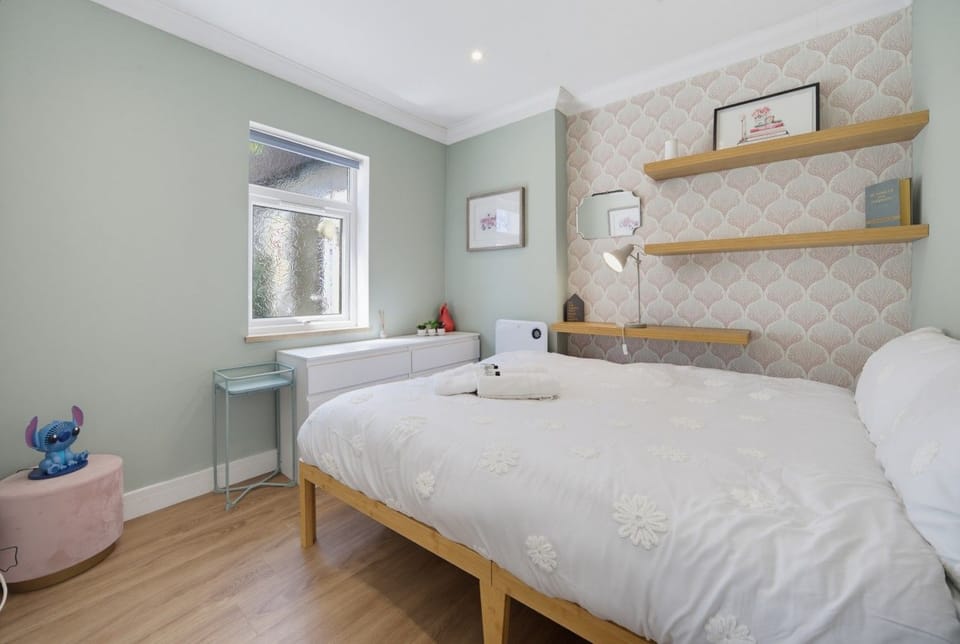 Unwind in a calm bedroom with a comfortable double bed.