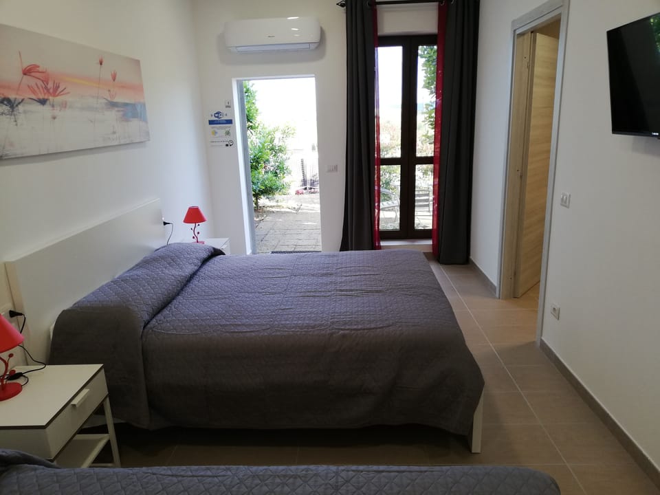 Triple Room, 1 Bedroom, Poolside | 1 bedroom, in-room safe, blackout drapes, soundproofing