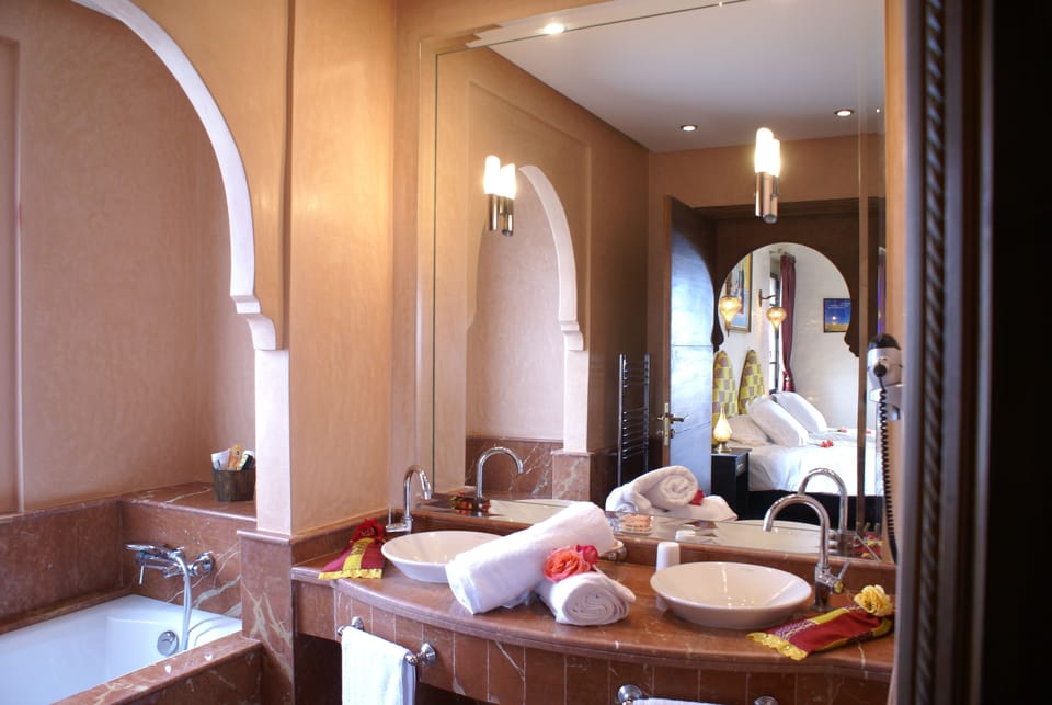 Combined shower/tub, free toiletries, hair dryer, bathrobes