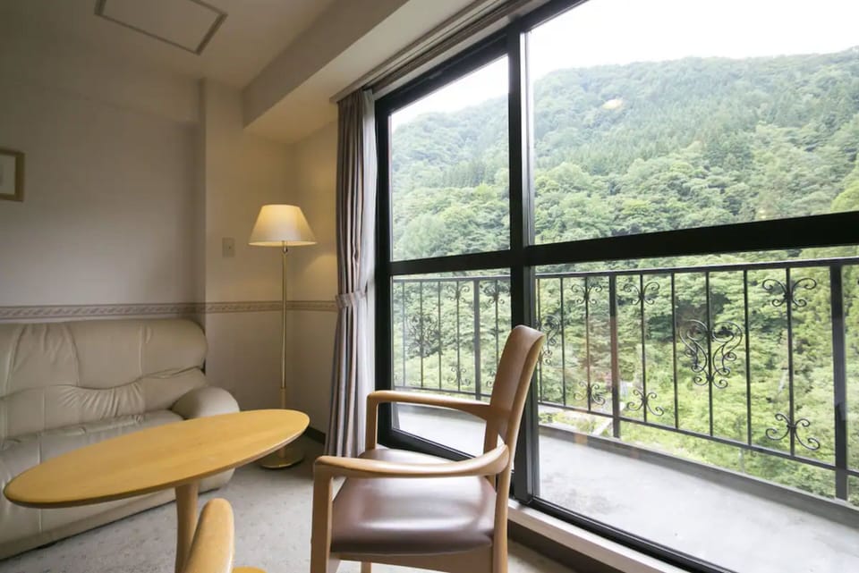 Twin Room, Half board, Non Smoking | Premium bedding, in-room safe, desk, iron/ironing board