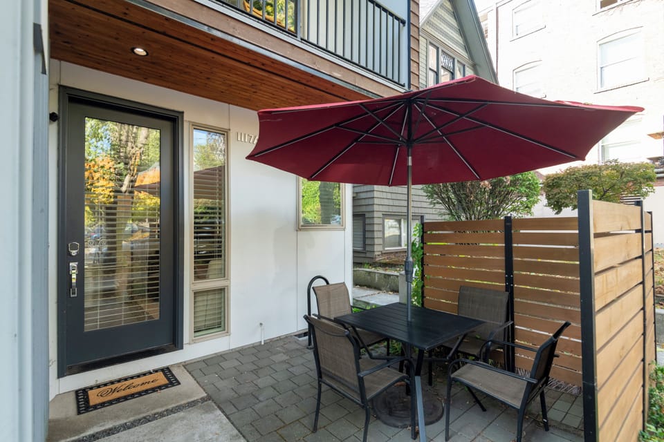 Private patio with shaded outdoor dining for four