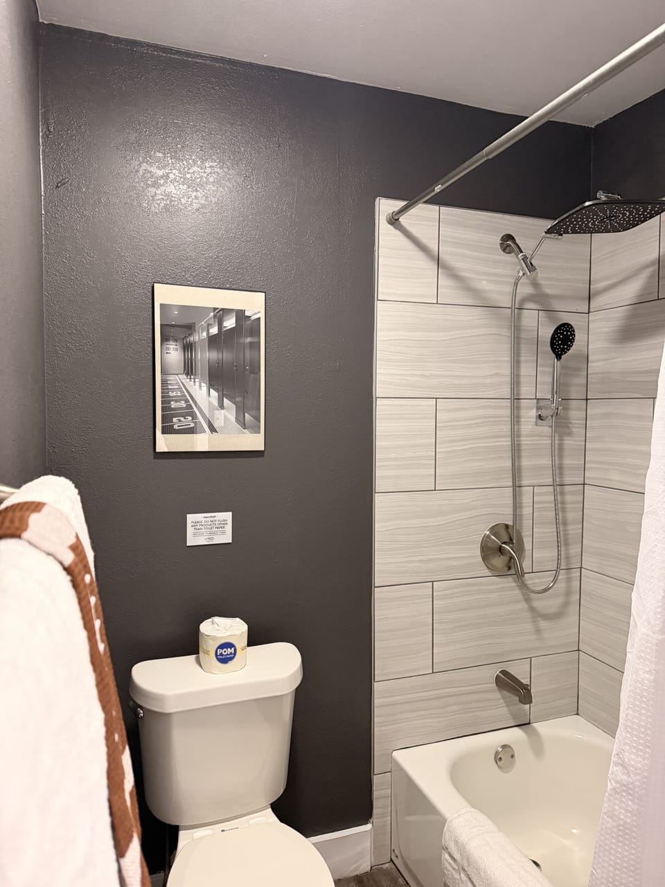 Modern bathroom with tiled tub-shower and relaxing rainfall head