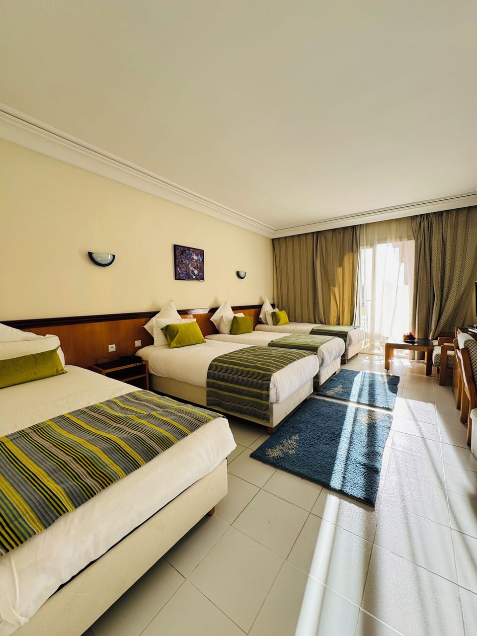 Deluxe Quadruple Room, Non Smoking, City View | Minibar, in-room safe, desk, blackout drapes