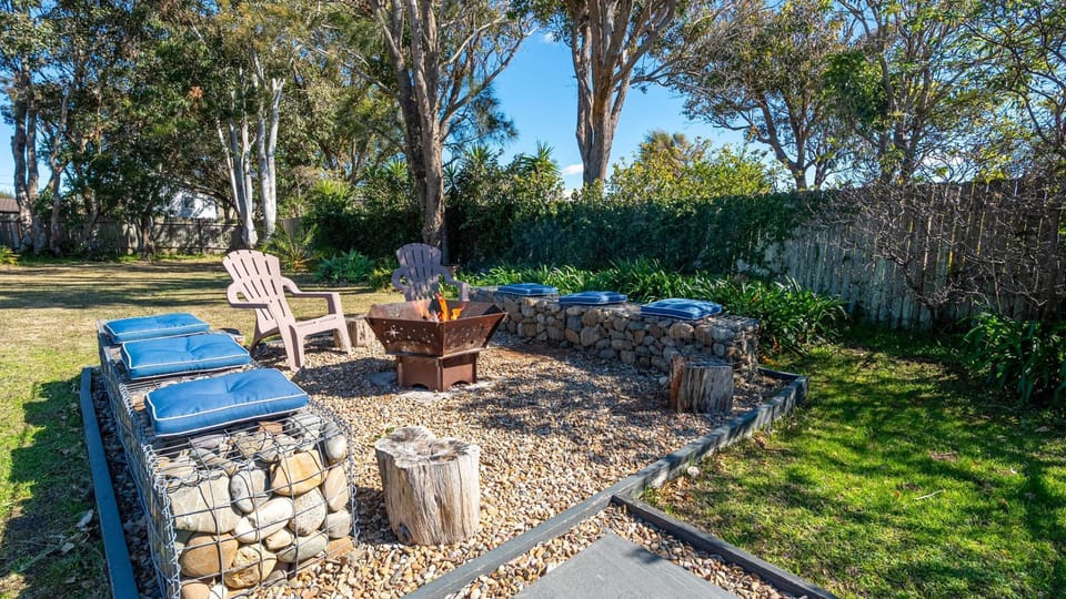 Beach Sanctuary | Firepit | Firepit seating | Garden