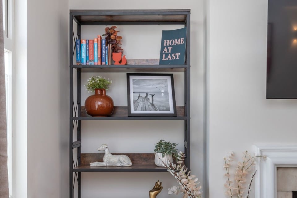 Thoughtful decor and curated library for a `home away from home` feel.