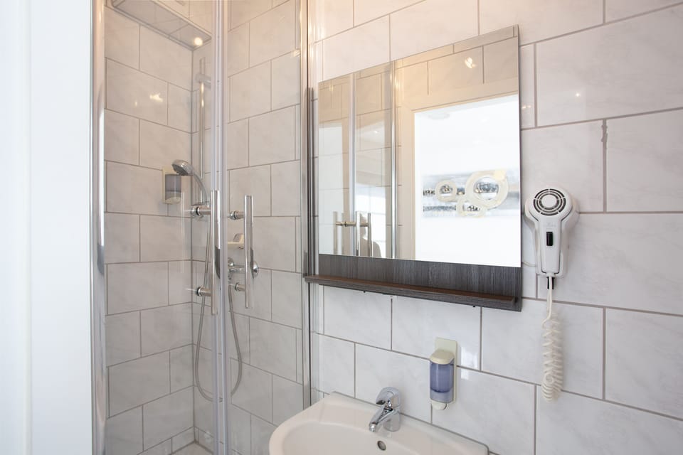 Micro Double Room | Bathroom | Hair dryer, towels, toilet paper