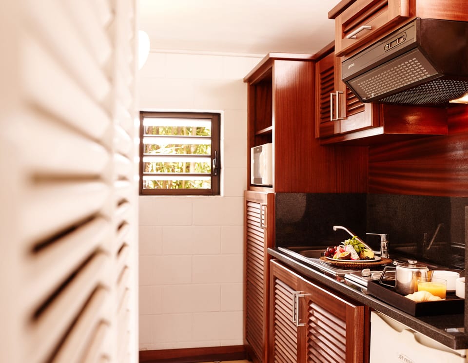 Family Bungalow | Private kitchenette | Coffee/tea maker, electric kettle