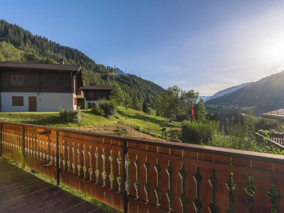 Private balcony with beautiful views over Niederernen, the valley, and surrounding mountains.
