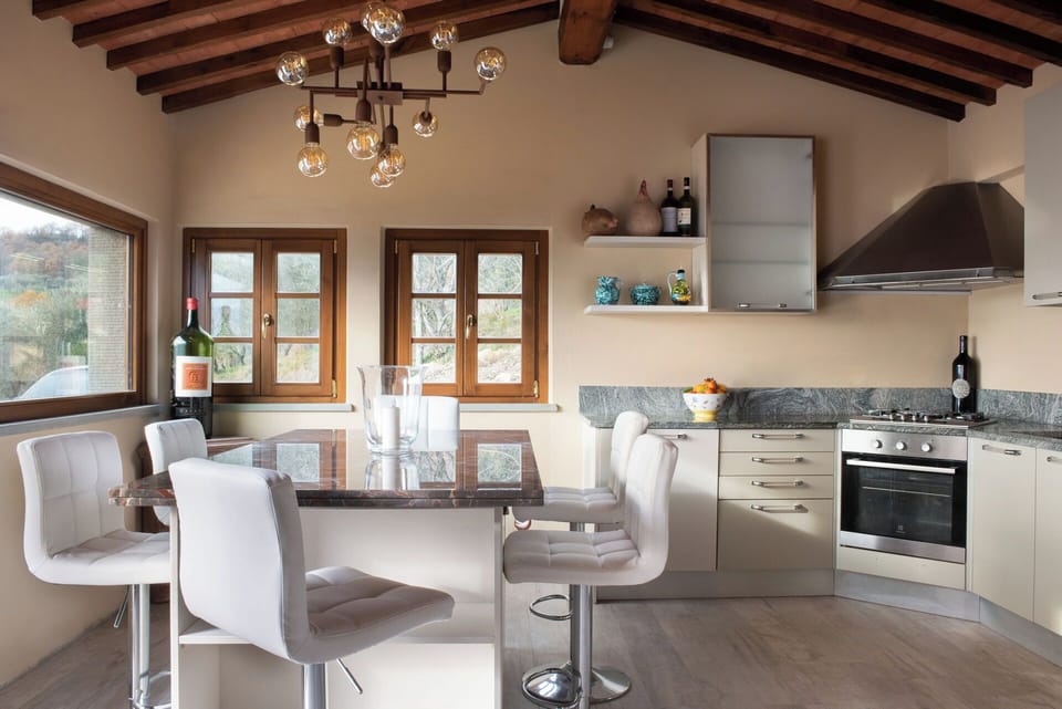 Furniture, Interior Design, Kitchen, Countertop, Flooring, Light Fixture, Wood, Cabinetry, Ceiling, Home