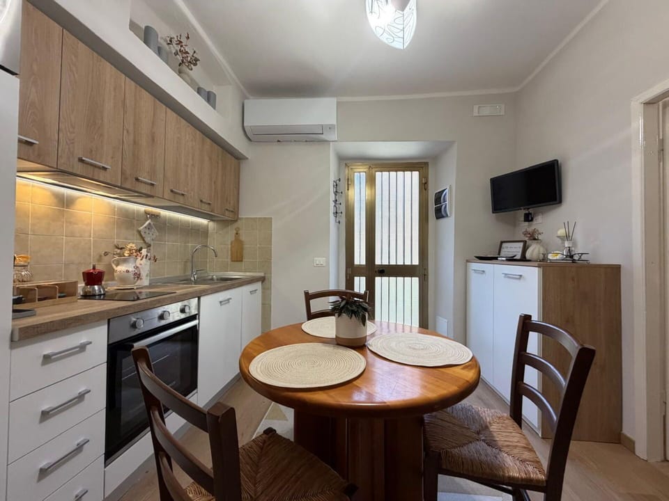 Furniture, Interior Design, Flooring, Major Appliance, Kitchen Appliance, Countertop, Wood, Ceiling, Kitchen, Room