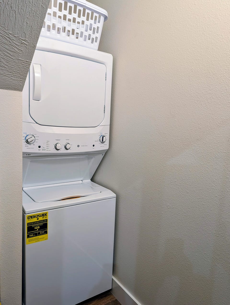 Indoor laundry room furnished with all essentials 
